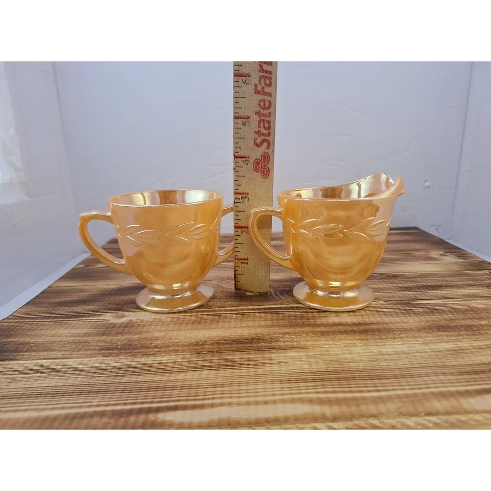 FIRE KING OVEN WARE PEACH LUSTER LAUREL LEAF SUGAR BOWL AND CREAMER‎